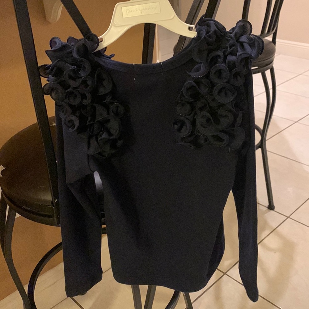 Girl’s size 4 Lola’s shirt. Worn, tags attached